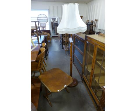 A beech standard lamp and an Art Deco oak folding firescreen 