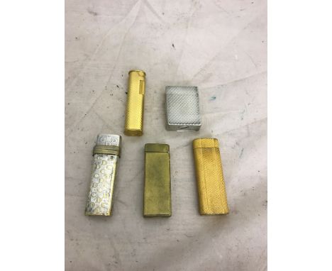 Five lighters, Dunhills, Christian Dior, Cartier and Dupont