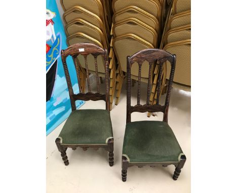 A pair of bobbin-turned oak chairs