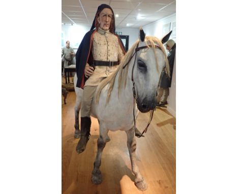 'THE CANTERBURY TALES' A FIBREGLASS STUDY OF 'A KNIGHT ON A WHITE HORSE' (The Knight's Tale), with cream uniform and cloak, 1