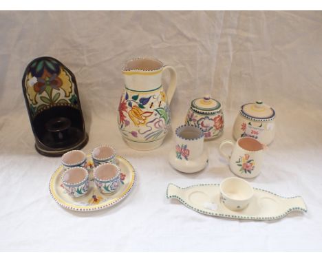 A GOUDA POTTERY CANDLESTICK and a collection of traditional Poole Pottery
