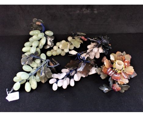 FIVE 'JADE' BUNCHES OF GRAPES and a similar 'jade' floral candle holder (6)