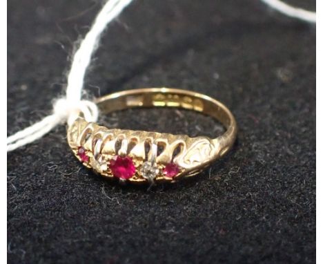 A RUBY AND DIAMOND GYPSY STYLE RING, on an 18ct yellow gold shank, ring size P