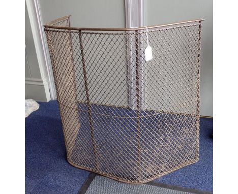 A VICTORIAN BRASS-TOPPED WIREWORK NURSERY FIREGUARD, 66cms wide