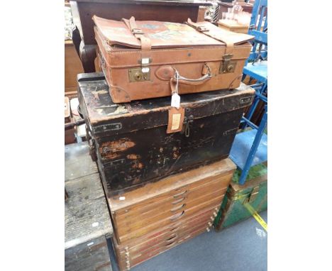 A VINTAGE LEATHER SUITCASE with numerous old Continental hotel labels, and a leather travelling trunk inscribed 'Capt. R.W. R