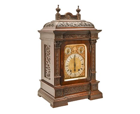 A German mahogany bracket clock, c1900, the gilt and lacquered brass dial, silvered chapter ring and twin subsidiary rings wi