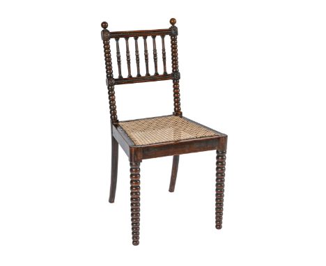 An early Victorian bobbin turned rosewood and caned chair, with spindle back  Good condition