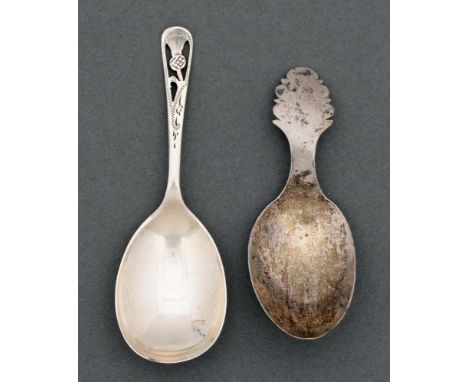 A Dutch silver caddy spoon, 1835 and another, Sheffield 1937, 13dwts (2)  Good condition