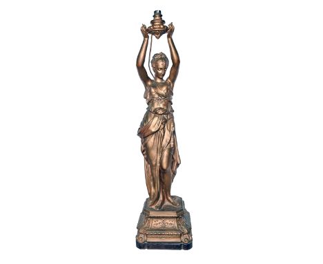 A French fin de siecle spelter figural lamp, c1900, in the form of a young woman on square base, later gilt, 84cm h excluding