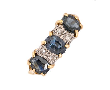 A sapphire and diamond ring, in 18ct gold, London 1965, 3.7g, size M  Good condition