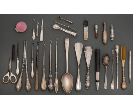 Miscellaneous silver handled button hooks, manicure accessories and other articles, to include a silver and pink guilloche en