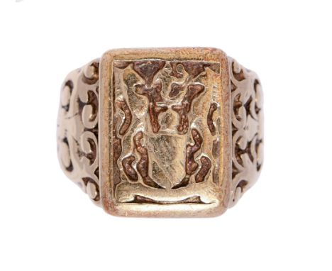 A gold pseudo armorial signet ring, marks rubbed, 12.7g, size U  Scratches and wear