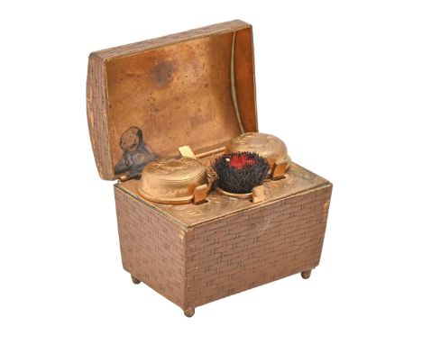 A French novelty travelling calf leather and brass inkwell as a basket, c. 1875, push-button mechanism, hinged cover, bun fee
