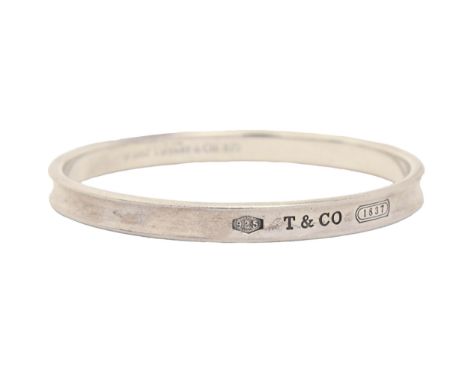 A Tiffany &amp; Co fluted bangle, 65mm (internal), 33g  Good condition