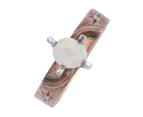 An opal and gem set ring, in gold marked 9ct, 2.9g size N  Good condition