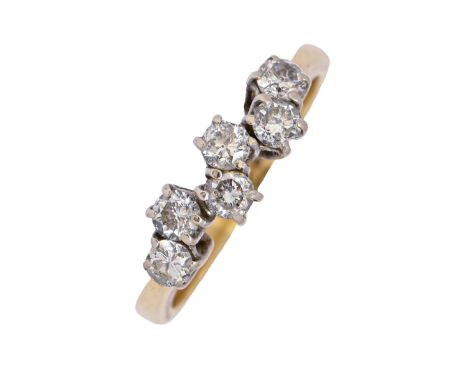 A diamond ring, in 18ct gold, import marked Birmingham 1989, 4.1g, size M  Good condition