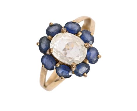 A sapphire and spodumene cluster ring, in gold marked 9k, 4.3g, size P  Good condition