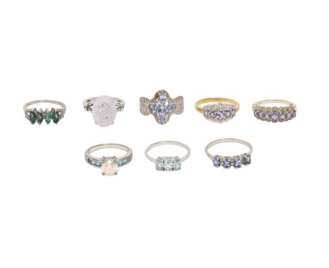 Eight silver or silver gilt rings, variously gem set, 28g, size R, S  Good condition