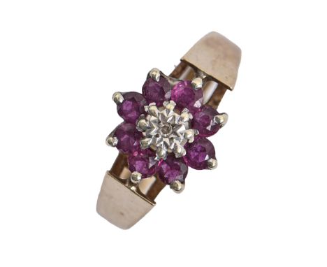 A ruby and diamond ring, in 9ct gold, 3.9g, size P  Good condition