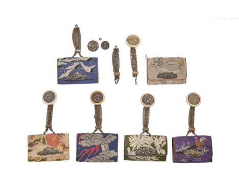 Six Japanese silk and leather tobacco pouches, early 20th c, with chased and silvered brass dragon or chrysanthemum or other 