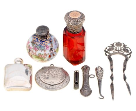 An Edwardian silver comb, Birmingham 1906, a sliver whistle and miscellaneous articles  Red glass scent bottle damaged