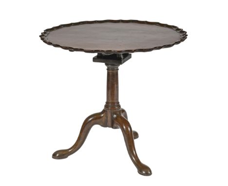 A George III mahogany tripod table, with birdcage action and later plum pudding mahogany top with moulded rim, 70cm h; 78cm d