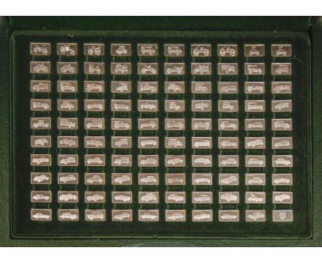 A set of 100 miniature silver ingots of classic cars, 10 x 17mm, marked 925, cased, approximately 5ozs  Good condition, as is