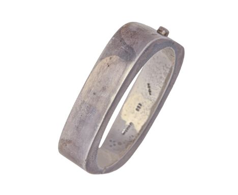 A Mexican silver modernist bangle, 60mm (internal), marked MEXICO 925, 59g  Good condition