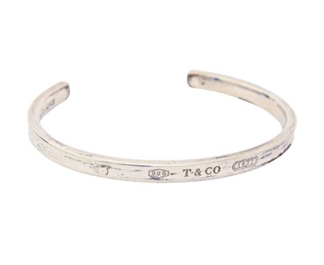 A Tiffany &amp; Co silver bangle, 61mm (internal), 20g  Good condition