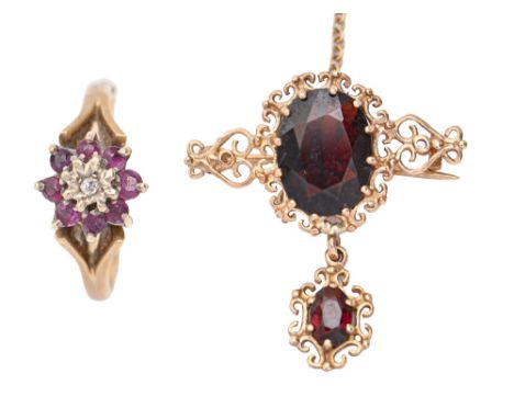 A gem set 9ct gold ring and garnet brooch, in gold, unmarked, 6.8g, ring size M  Ring worn, brooch in good condition