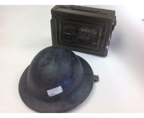 WW2 British Home Front Black painted ARP wardens helmet. Liner in relic condition.
WW2 US Army .30 cal ammo box. Holes drille