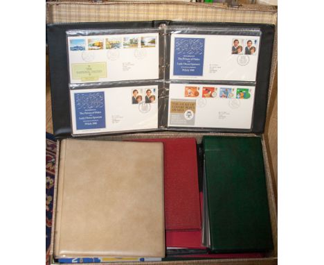 A heavy suitcase containing five x first day cover albums, together with several schoolboy collections, main value in early Q