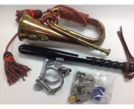 Bugle with Royal Welch Fusileers badge, Police Handcuffs and, truncheon, and various Nazi, DDR and Soviet badges, including a