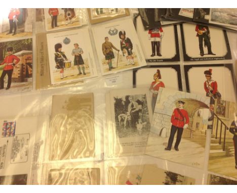 A folder containing post cards and embroideries from World War One and World War Two, along with first day covers 