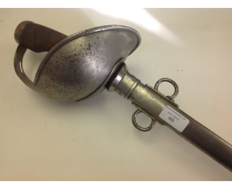 British 1908 pattern Cavalry Sword,
Well marked blade with numerous inspection stamps.
Complete with scabbard.