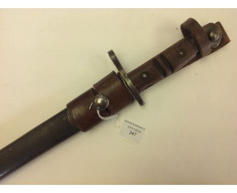 WW1 British P13 Bayonet made by Remington in the USA and dated 4-17. Complete with leather frog and scabbard.