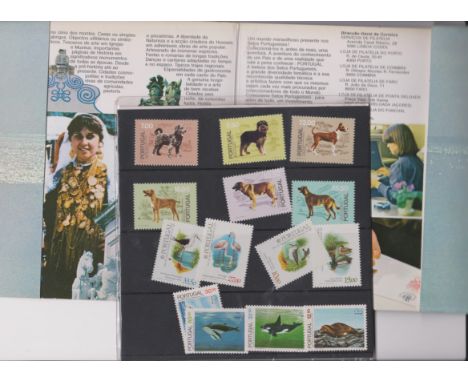 Portugal 1981-83 Portugal Port and Telecomms Fauna themed folder containing 1981 Kennel club 50th Anniv SG 1832-1837 u/m set,