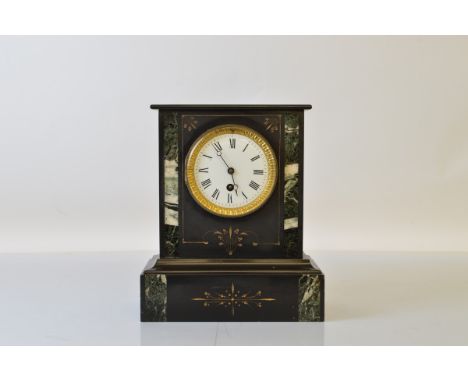 A late 19th century slate cased mantle clock, with white enamel dial, Roman numerals, with two keys.28.5cm tall.