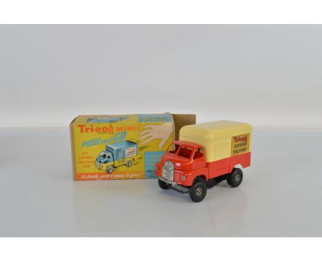 A boxed Tri-ang Minic Bedford 'Push and Go' #365M  Express Delivery Van in red and cream, VG, with rear shutter door and oper