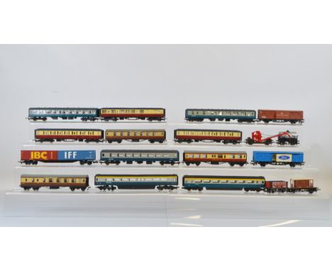 A quantity of unboxed OO gauge rolling stock, including Hornby Dublo, Hornby, Lima, Tri-Ang Hornby, etc. Together with a quan