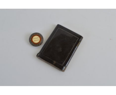 A silver enamel cigarette case, together with a silver Motor Omnibus badge, 112g
