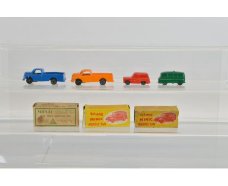 Three boxed Tri-ang Minic clockwork Morris Van models, including a hard to find  Minic Transport' Van in pale green, VG with 