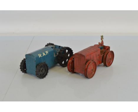A hard to find unboxed Tri-ang Pressed Steel RAF Tractor No.2 in blue with large white 'RAF' decals on either side of the eng