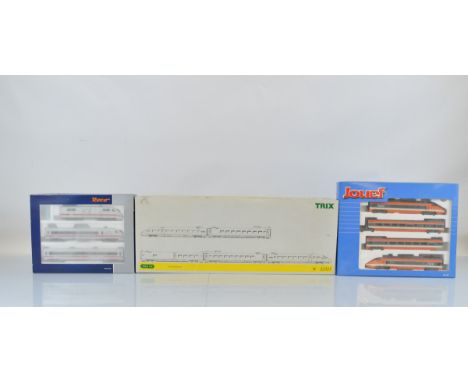 Three HO gauge model railway train sets, Trix 22325, Roco 63087 and Jouef HJ2012, all boxed (3)