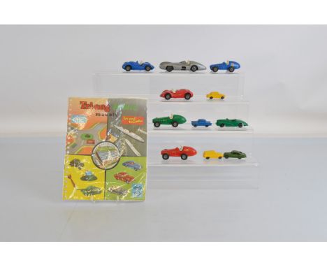 A group of unboxed Tri-ang plastic car models from their 'Push and Go' range including six Racing Cars,  Vanwall, Mercedes et