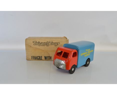 A boxed Tri-ang Pressed Steel TM6013 Express Delivery Van from their 'Diesel' range of vehicles in red and blue, approximatel