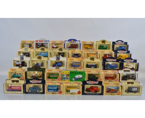 Sixty boxed Lledo Days Gone diecast models, with some loose examples and a boxed Vanguard model 
