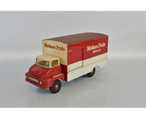 A unique unboxed Tri-ang Pressed Steel based Thames Trader Delivery Van in the maroon and white  'Mothers Pride Bread' livery