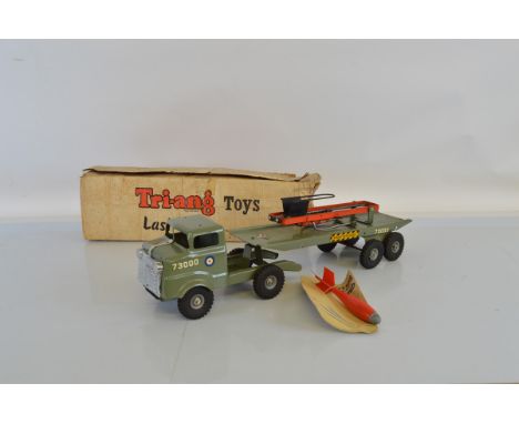 A very scarce boxed Tri-ang Pressed Steel Mechanical Horse with Rocket Launcher from their 'Junior Series' range, measuring a
