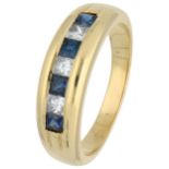 18K yellow gold row ring set with diamonds and sapphire